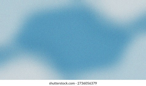 This image depicts a soft, abstract smudge in varying shades of blue that creates an impressionistic, cloud-like or cosmic formation. The texture is diffuse and lacks sharp edges, giving it an ethereal and somewhat mysterious appearance. The gradient and blending of colors suggest a natural, possibly atmospheric phenomenon.