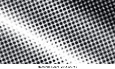 This image displays a halftone dot pattern, transitioning from a dense black area to a white space. The dots vary in size and density, creating a gradient effect. It is a monochrome visual.