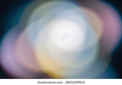 This image features blurred circular light flares in pastel colors, creating an abstract and out-of-focus photographic effect. The soft, translucent light provides a gentle, atmospheric quality.