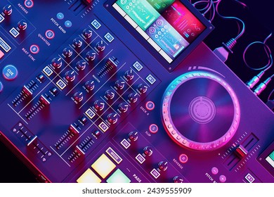 This image features a close-up view of a DJ mixing console, bathed in neon lights, highlighting its intricate controls and vibrant ambiance within a nightclub setting. - Powered by Shutterstock