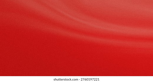 This image features a close-up view of a vibrant red textured background. The texture appears to be slightly rough and uneven, giving it a tactile feel. The rich, deep red color dominates the entire frame, creating a striking and bold visual effect.