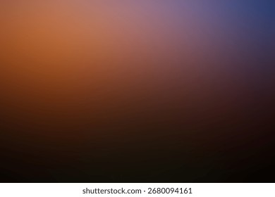 This image features a dark gradient of brown, orange, and blue, creating a dramatic and atmospheric background. It is ideal for adding depth and intrigue.