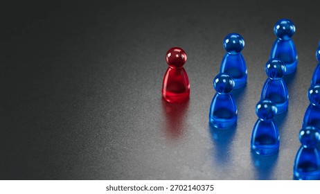 This image features a red glass game chess amidst blue ones on a dark background. It symbolizes individuality, standing out, and being unique in a group. 3d rendering,conceptual image.