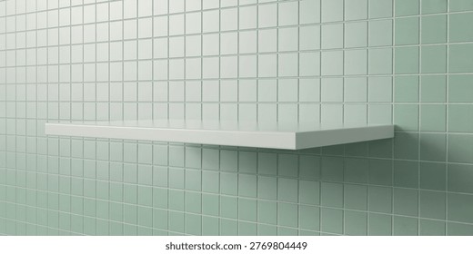 This image features a sleek white shelf attached to a wall covered in mint green square tiles, creating a clean and minimalist look typical of modern bathroom design. The simplicity and elegance of the setup evoke a sense of calm and serenity, making it perfect for a luxurious bathroom setting.