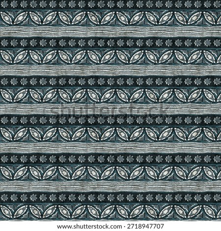 This seamless repeating pattern features horizontal stripes composed of floral and leaf motifs inspired by traditional hand block printing and ethnic textile designs. Rendered in muted blue, teal, grey, and off-white tones, the artwork reflects a calm, earthy, and handcrafted aesthetic commonly seen in Indian and Asian fabric traditions.

The pattern combines organic floral shapes, stylized leaves, and textured stripe elements, giving it a naturally imperfect, hand-printed look. Its seamless repeat makes it ideal for fabric printing, apparel textiles, sarees, kurtis, shirts, home décor, upholstery, wallpapers, wrapping paper, and surface pattern design projects.

With its soft color palette and timeless folk character, this design suits both modern and traditional applications. Perfect for fashion designers, textile manufacturers, interior designers, and digital creatives seeking an authentic, artisan-inspired pattern with a versatile and elegant appeal.