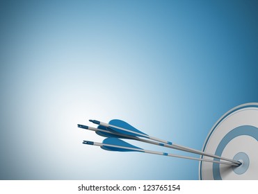 three arrows hitting the center of a target. Image over a blue background with free space for text