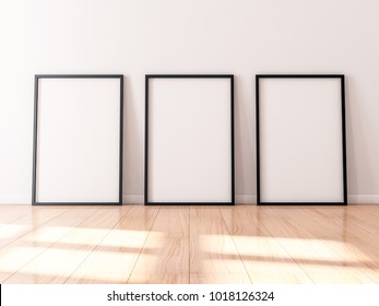 Three Black Frames Mockup With Poster Canvas Standing On Wooden Floor, 3d Rendering