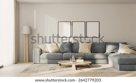 Three blank frames in modern living room interior with blue sofa and white wall, 3d render