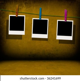 Three Blank Photos Hanging On A Clothes Line