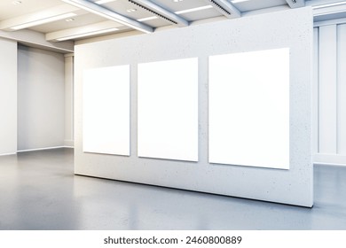 Three blank posters on a gallery wall, clean modern interior with concrete and white elements, concept of an art display. 3D Rendering