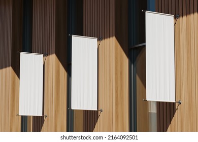 Three blank roll up posters in row mounted, side view, wooden wall. Building exterior with city mockup copy space banner for advertising. 3D rendering