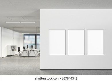 Three Blank Vertical Posters On The Wall In Modern Office With Clipping Path Around Poster. 3d Illustration