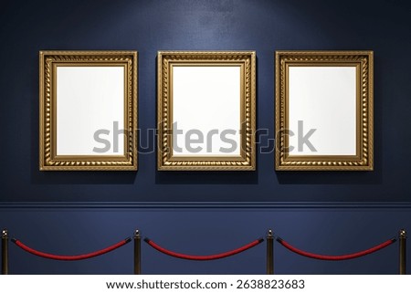 Three empty ornate gold frames on a dark blue gallery wall, spotlighted and roped off, representing a clean exhibition or museum display concept. 3D Rendering