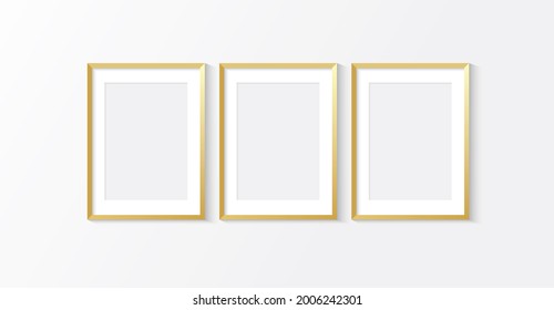 Three Golden Rectangular Vertical Frames Hanging On A White Textured Wall Mockup 3D Illustration