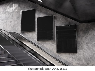 Three Vertical Billboards On Underground Wall Mockup. Hoardings Advertising Triptych On Subway Wall Interior 3D Rendering