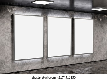 Three Vertical Billboards On Underground Subway Wall Mockup. Hoardings Advertising Triptych On Train Station Interior 3D Rendering