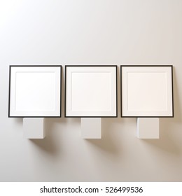 Three White square posters with black frame Mockup on white wall, 3d rendering