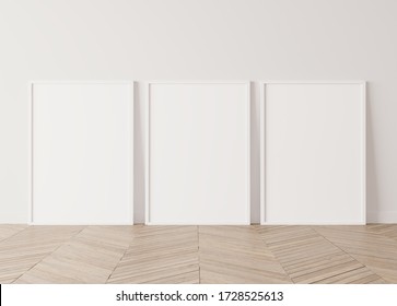 Three White Vertical Frames Standing On Parquet Floor With White Background, Minimal Frame Mock Up Interior, 3d Render, 3D Illustration