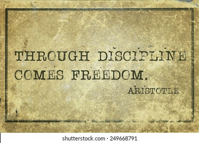 through discipline comes freedom - ancient Greek philosopher Aristotle quote printed on grunge vintage cardboard