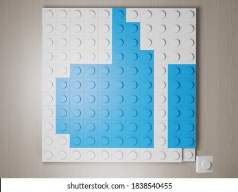 Thumb Up Icon Made From Blocks. Plastic Bricks Are Falling Down On White Background From Toy Constructor. Blue Symbol Of Thumb Up From Building Blocks. 3D Photo-realistic Render. Top View