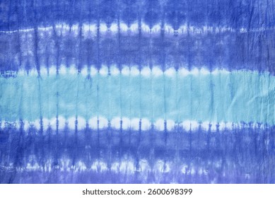 tie dye pattern hand dye on cotton fabric abstract texture backgrounds.