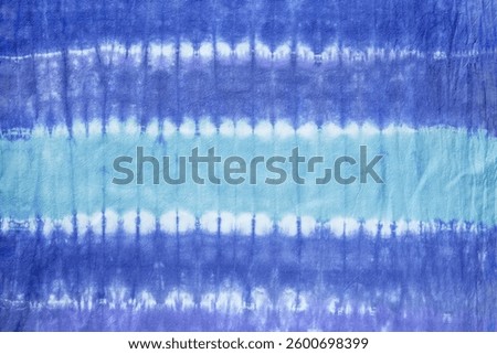 tie dye pattern hand dye on cotton fabric abstract texture backgrounds.