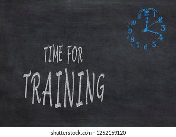 Time for Training - clock with text on black background to mean a concept