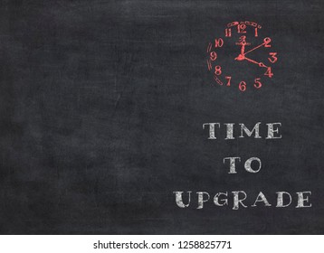 Time to Upgrade - clock with text on black background to mean a business concept