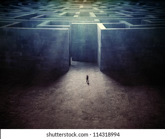 Tiny man entering a mysterious maze