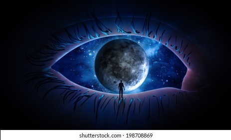 Tiny person standing looking at the Moon through an open eye - imagination concept