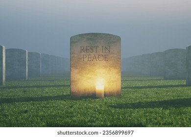 A tombstone stands tall among the green grass and other graves, illuminated by a single candle. The misty fog adds a touch of mystery. In the memory of. Rest in peace. Haunted necropolis. Nightmare - Powered by Shutterstock