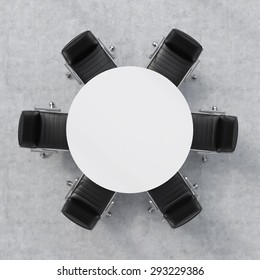 Top View Of A 3d Rendering Conference Room. A White Round Table And Six Chairs Around. Office Interior.