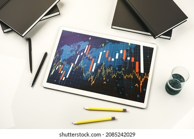 Top View Of Abstract Creative Financial Graph With World Map On Modern Digital Tablet Monitor, Forex And Investment Concept. 3D Rendering