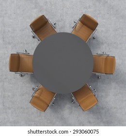 Top View Of A Conference Room. A Dark Grey Round Table And Six Brown Leather Chairs Around. 3D Rendering