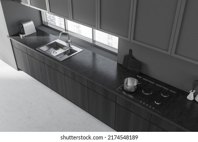 Top View Of Dark Kitchen Interior With Deck And Kitchenware, Light Concrete Floor. Panoramic Window On Singapore City View. 3D Rendering