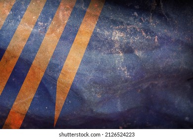 Top View Of Flag The Dutch Ministry Of Defence, Netherlands. Retro Flag With Grunge Texture. Dutch Patriot And Travel Concept. No Flagpole. Plane Design, Layout. Flag Background