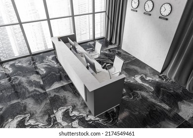 Top view of grey office interior with reception desk and pc computer, world clock and panoramic window on Singapore city view. Entrance hall and dark tile marble floor, 3D rendering