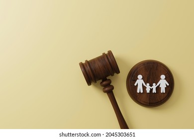 Top View Of Judge Gavel And Icon Human Family. Family Law Or Divorce, Legality, Adoption Concept. 3d Illustration