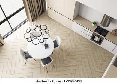 Top View Of Loft Kitchen Interior With Furniture, City View And Sunlight. 3D Rendering