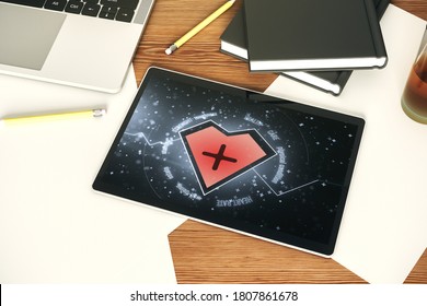Top view of modern digital tablet monitor with creative abstract heart rate hologram. Healthcare technolody concept. 3D Rendering