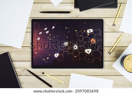 Top view of modern digital tablet monitor with creative abstract medical hologram. Healthcare technolody concept. 3D Rendering