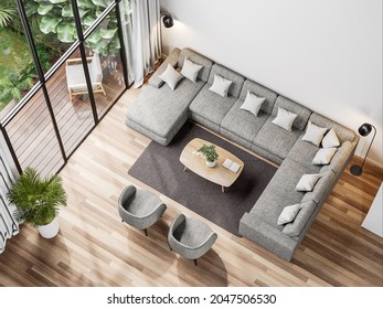 Top view of modern living room with tropical style garden view 3d render,The Rooms have wooden floors ,decorate with gray fabric sofa, Overlooks wooden terrace and green garden.