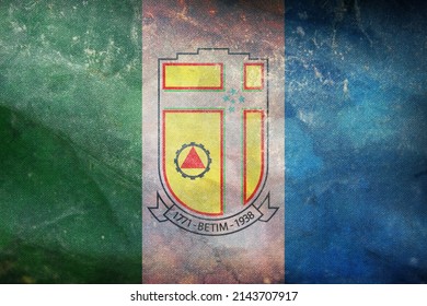 Top view of retro flag Betim, Brazil with grunge texture. Brazilian patriot and travel concept. no flagpole. Plane design, layout. Flag background