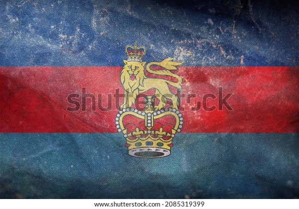 Top view\
of retro flag of the British Secretary of State for Defence .\
grunge flag of united kingdom of great Britain, England. no\
flagpole, Plane design, layout. Flag\
background