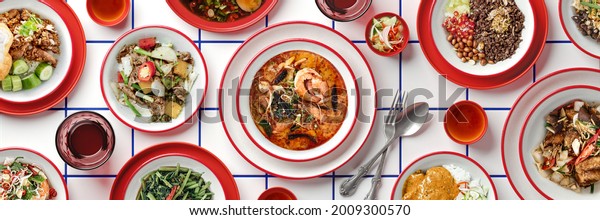 Top view of Thai food dishes with tableware setting on white ceramic tile with blue grout background. 3d render with food photo montage. Clipping path of each element included.