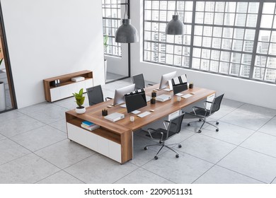 Top View Of White Coworking Interior With Armchairs And Pc Computer On Desk, Drawer With Documents. Work Zone With Panoramic Window. Mockup Copy Space Wall. 3D Rendering