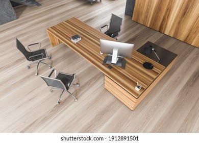 Top View Of Wooden And Black Office Room With Armchairs And Wooden Table With Computer On Parquet Floor. Minimalist Consulting Business Room, 3D Rendering No People