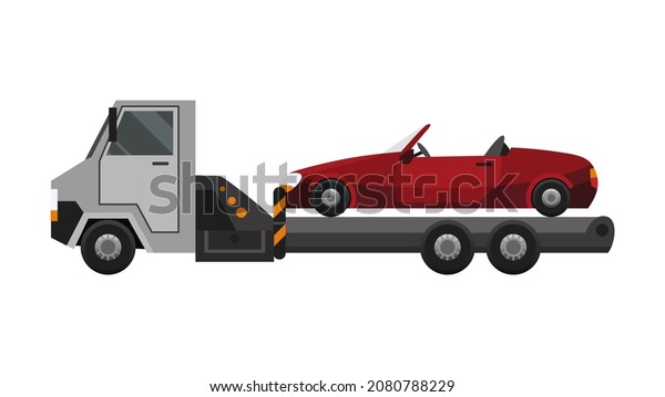 Tow truck. Flat faulty car loaded on a tow truck.\
Vehicle repair service which provides assistance damaged or\
salvaged cars