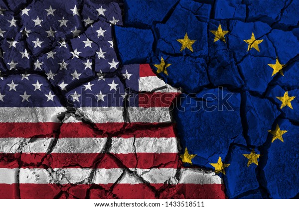 Trade war between United states of america Versus\
Europe . flag on cracked wall background . Confliction and crisis\
concept .