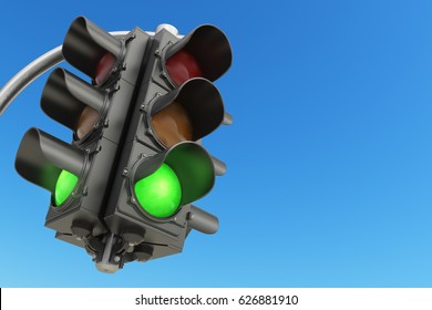 Traffic Light With Green Color On Blue Sky Background. 3d Illustration